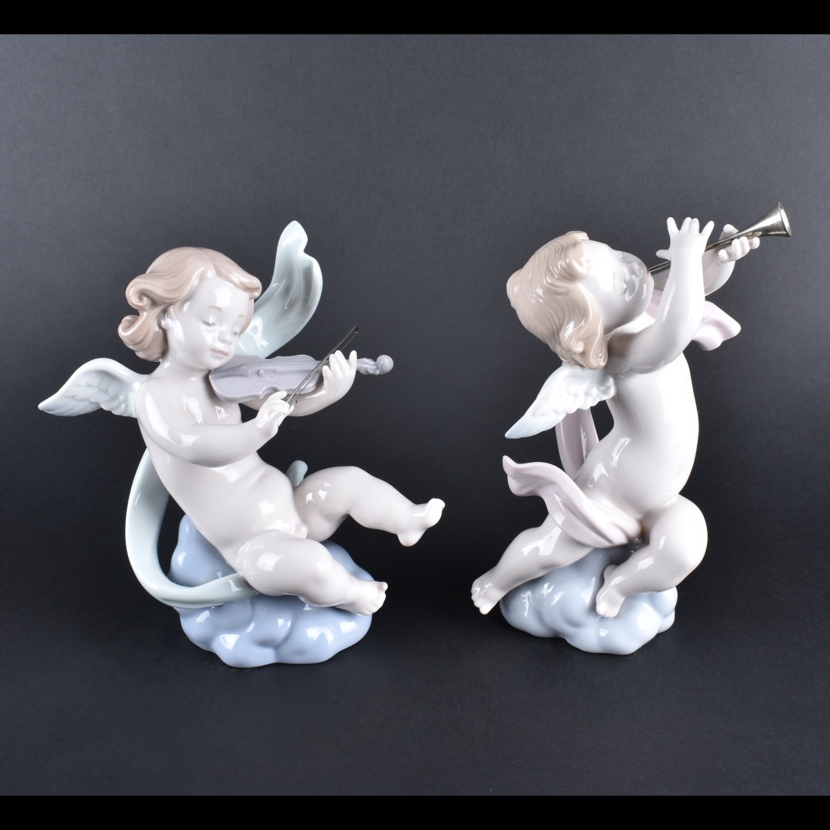 Two Lladro Musical Cherub Figurines