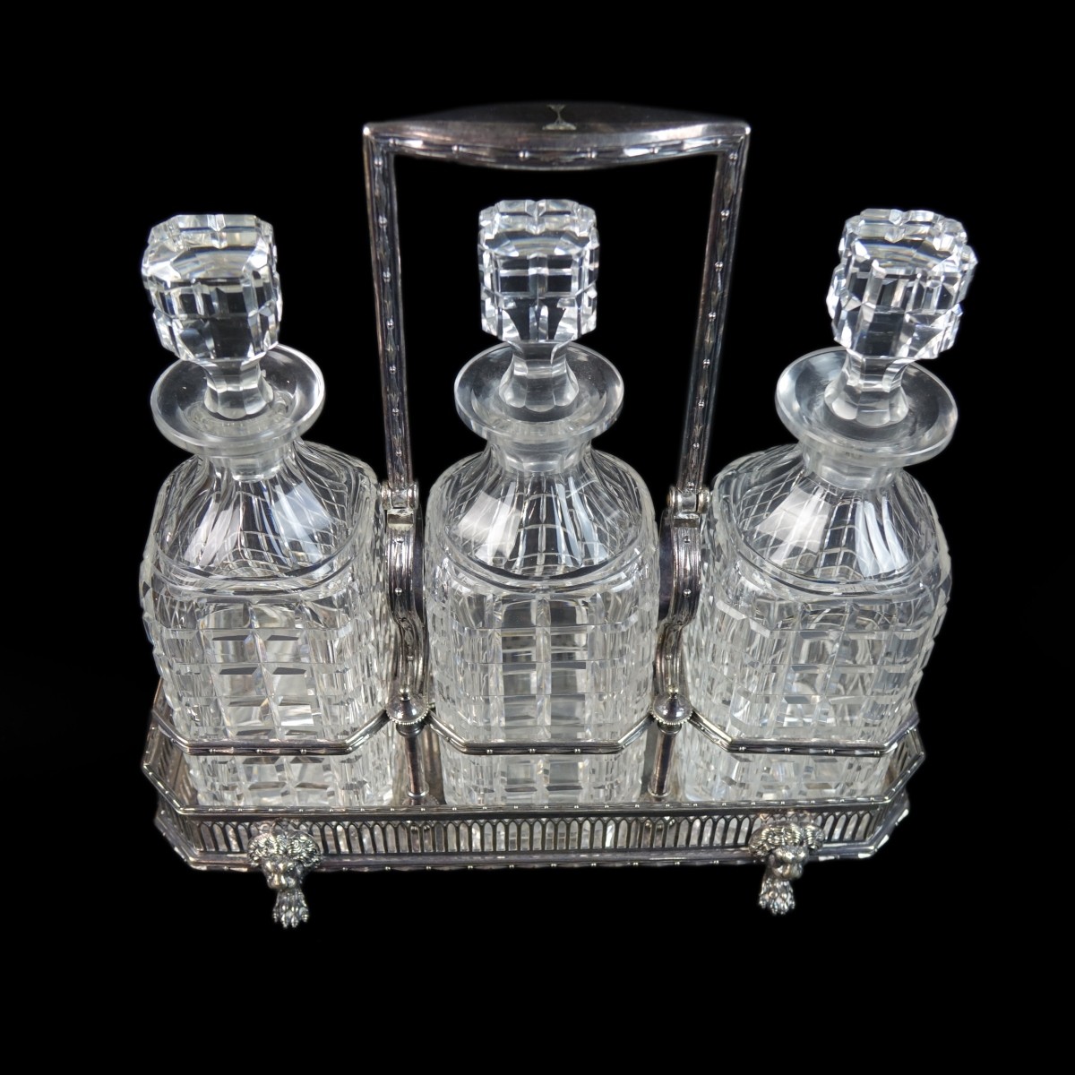 Antique English Tantalus Three Decanter Set