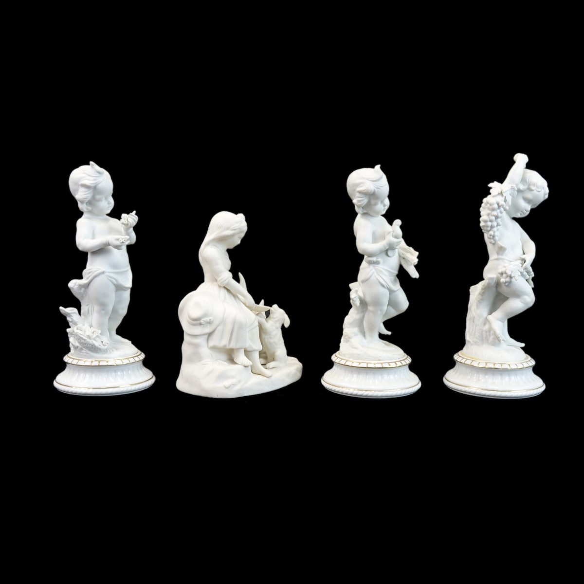 4 Vintage Bisque Figurines