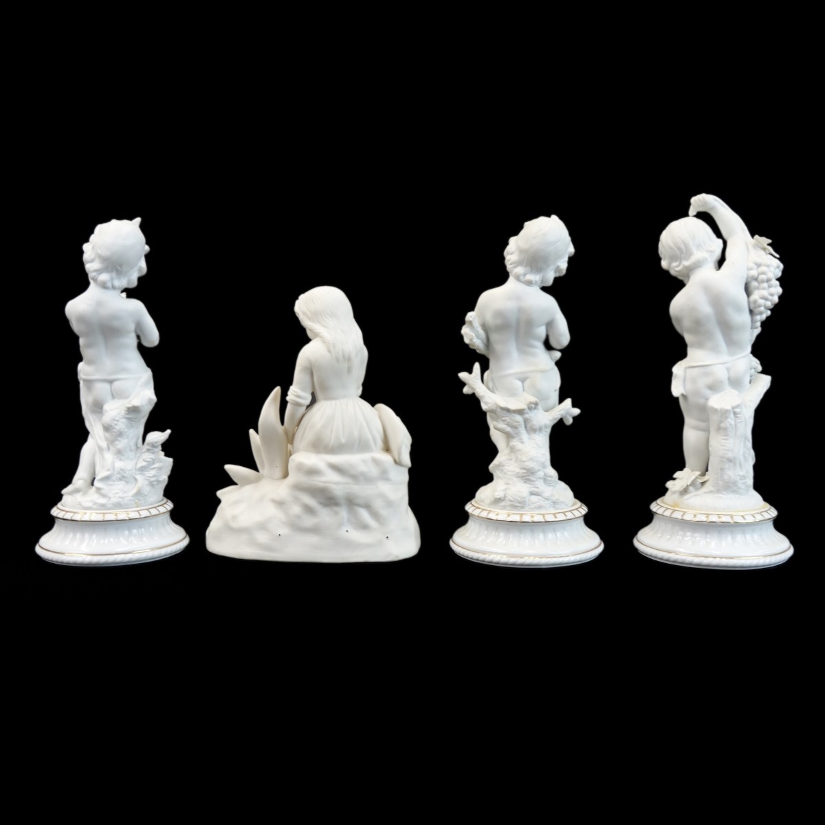 4 Vintage Bisque Figurines