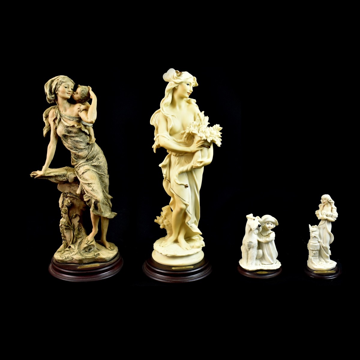 Four Giuseppe Armani Figurines