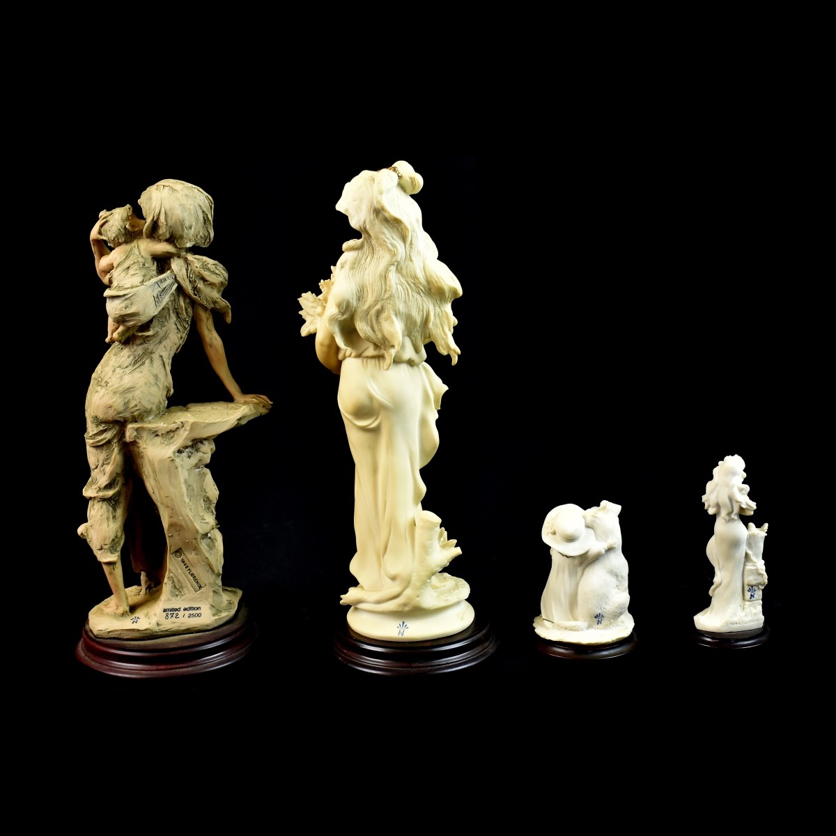 Four Giuseppe Armani Figurines