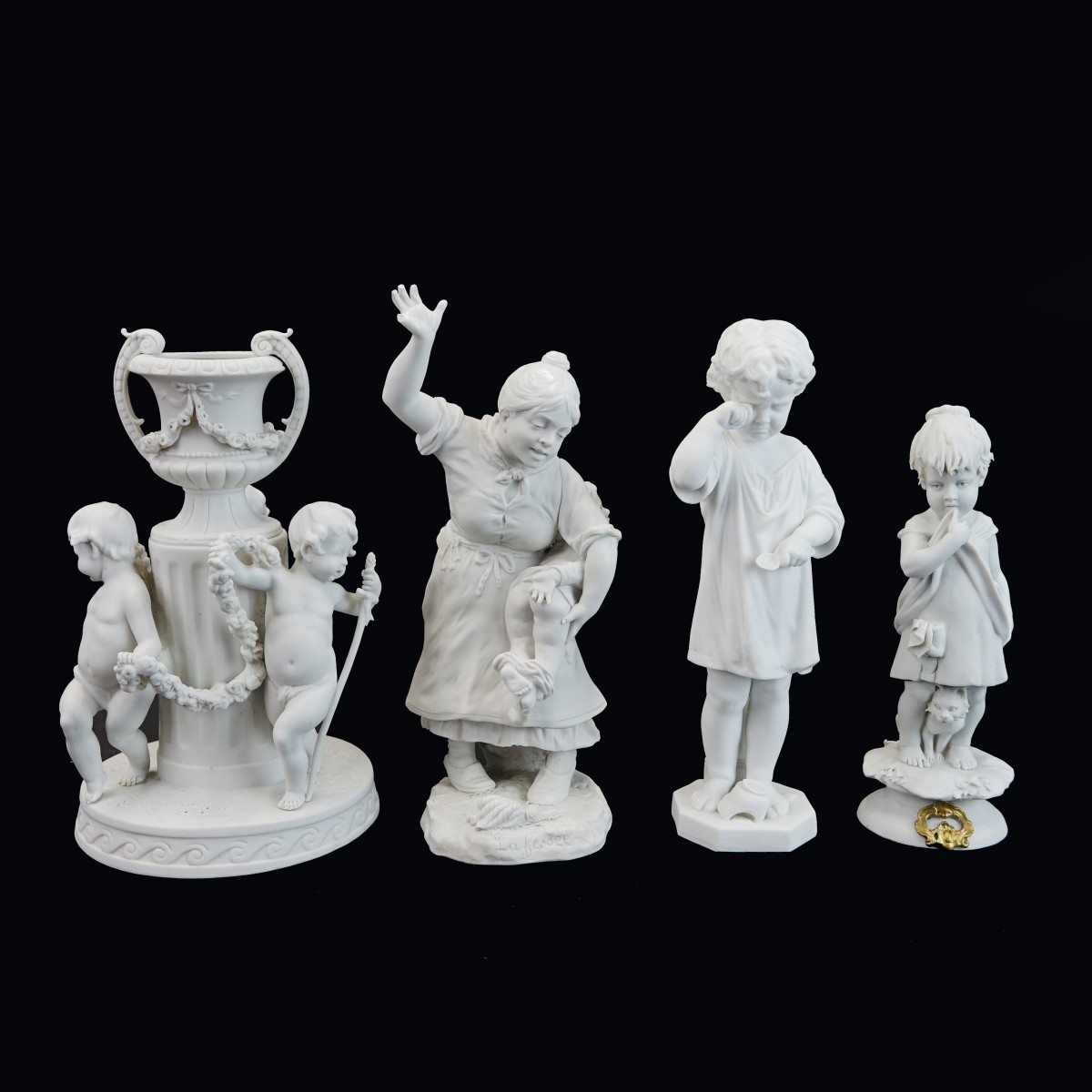 Four (4) Vintage Bisque Figurines