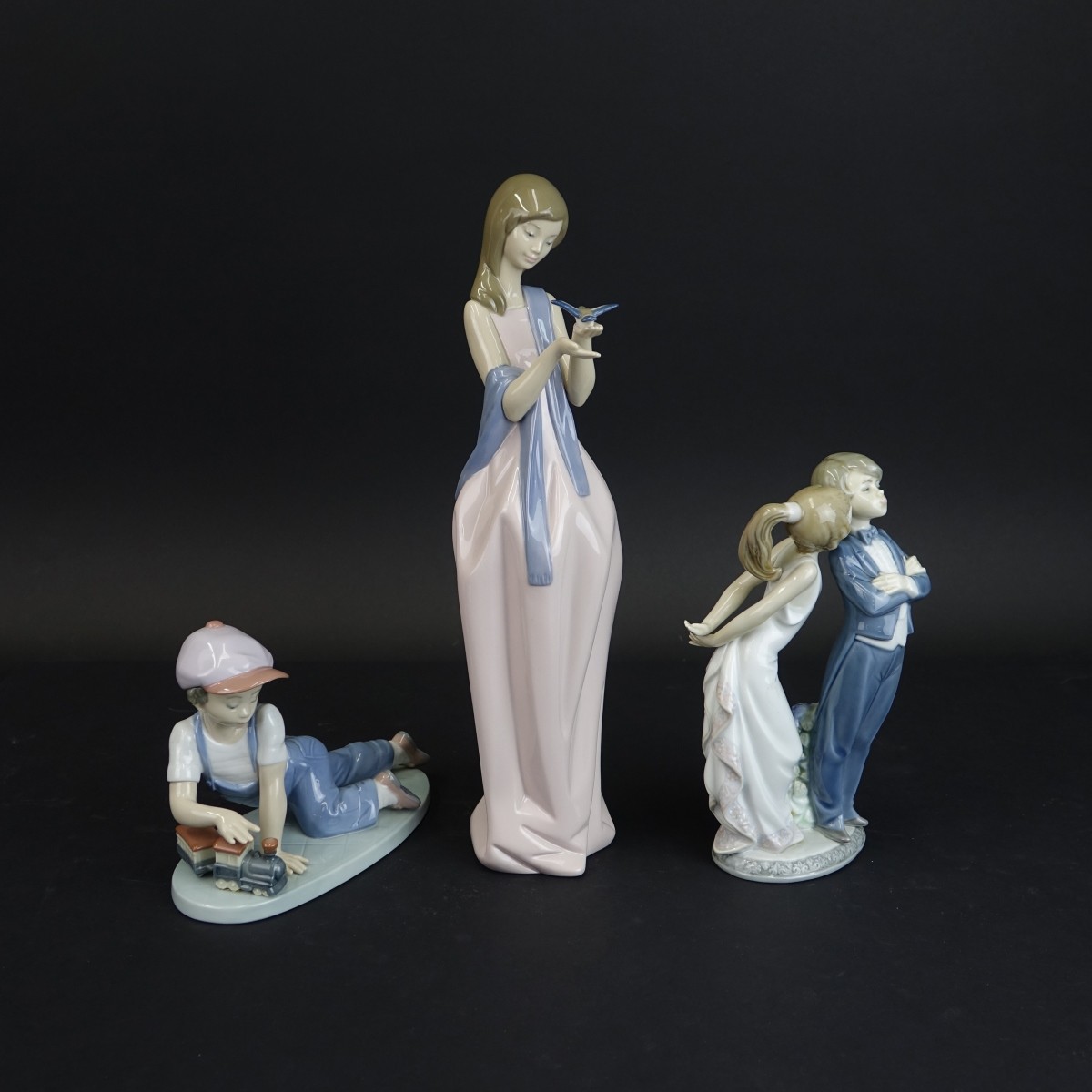 Three (3) Vintage Glazed Porcelain Figurines