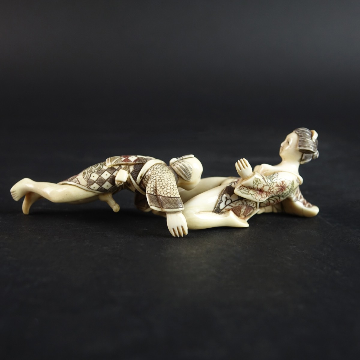 Pair of Japanese Polychrome Erotic Netsukes