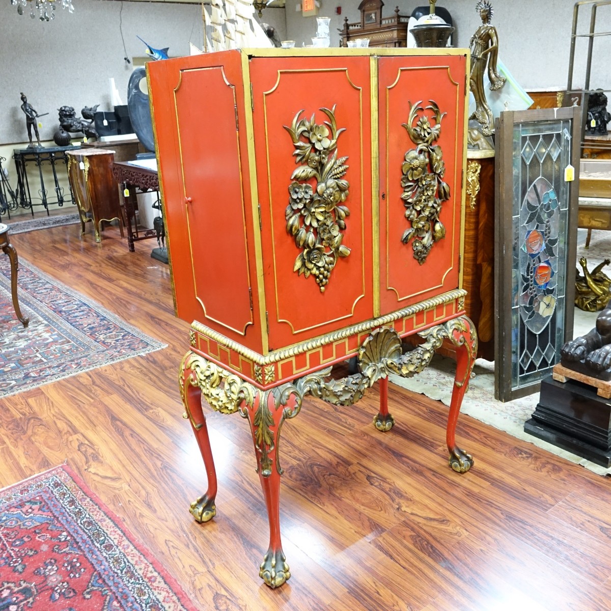 Mid 20th C. Red lacquer and Gilt Painted Cabinet