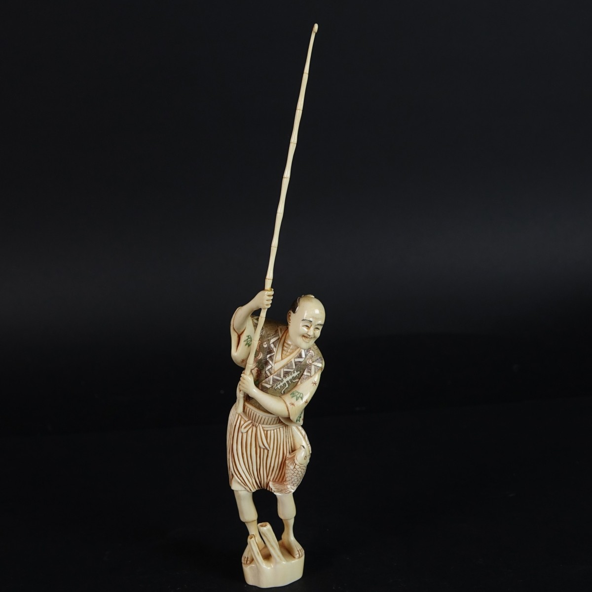 Antique Japanese Fisherman Figurine