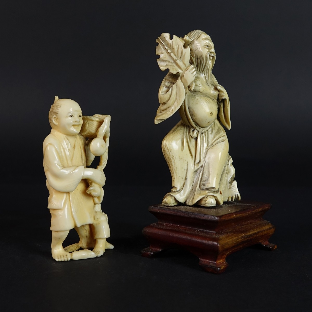 Two (2) Oriental Carved Figurines