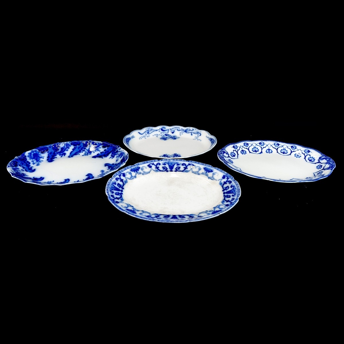 Four (4) Large Antique Flow Blue Serving Platters