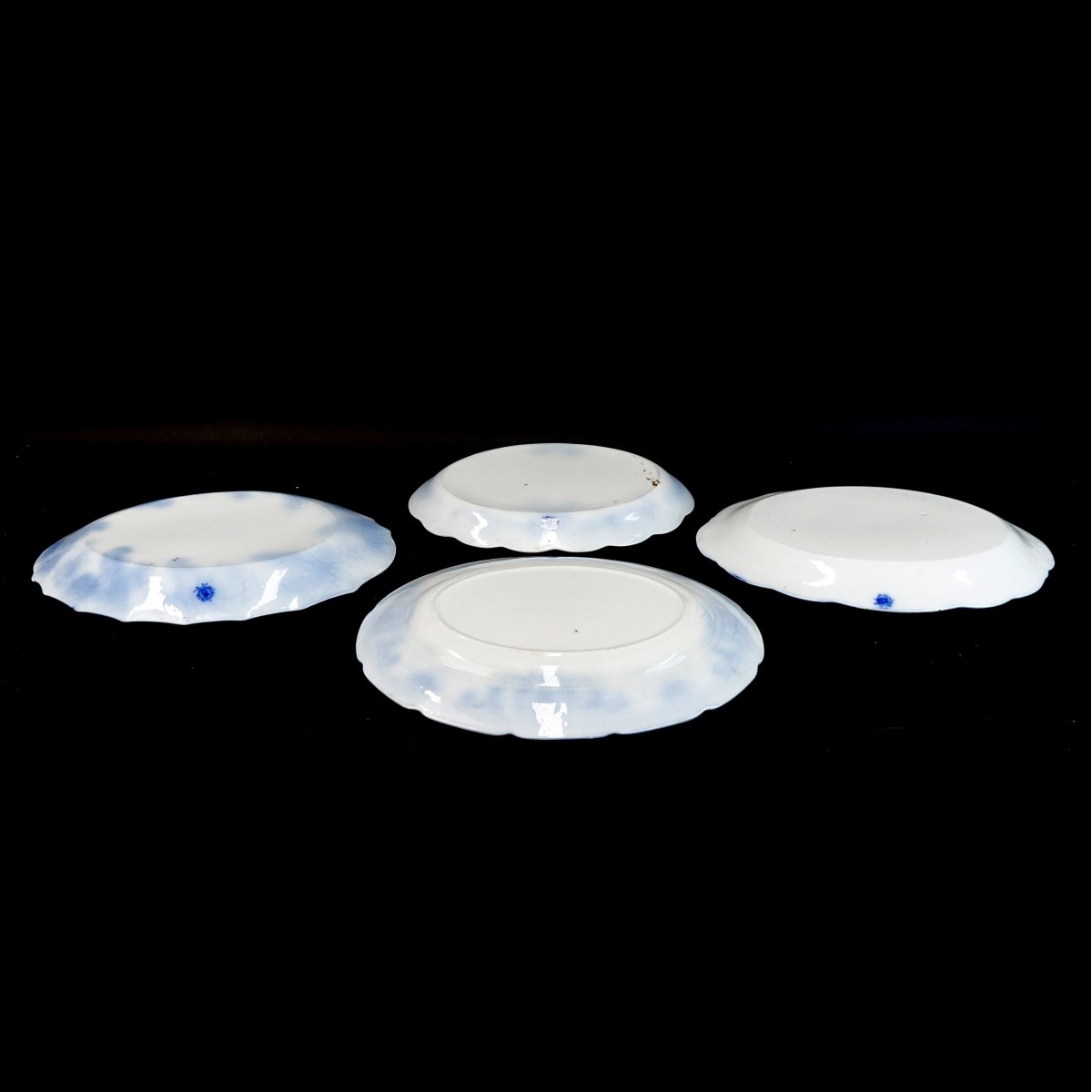 Four (4) Large Antique Flow Blue Serving Platters