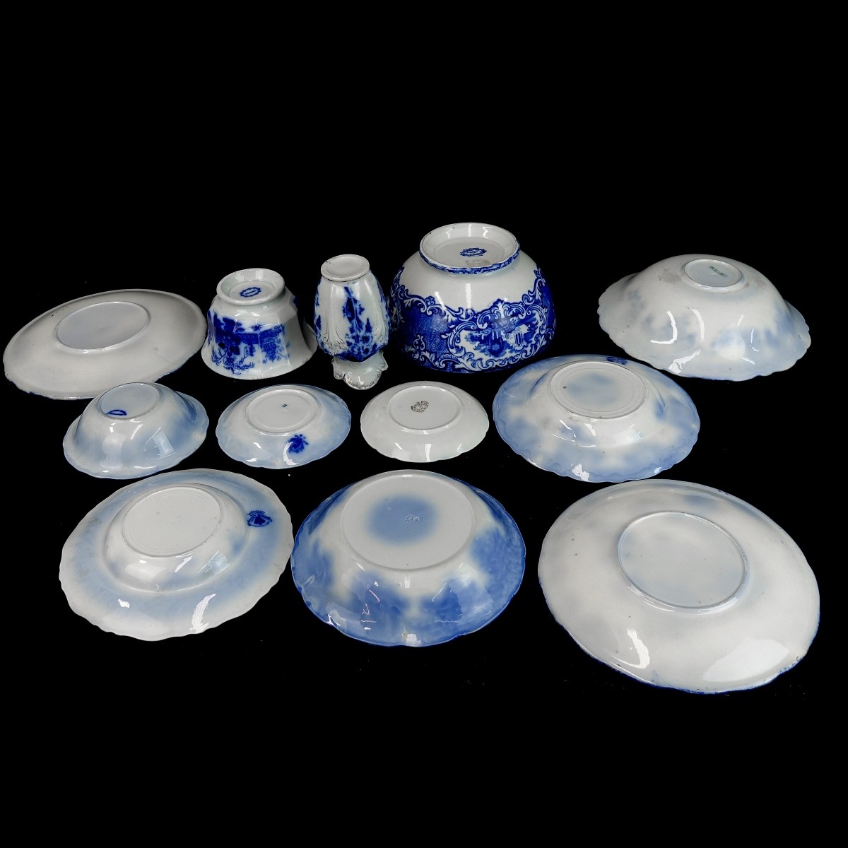 Twelve (12) Antique Flow Blue Tableware