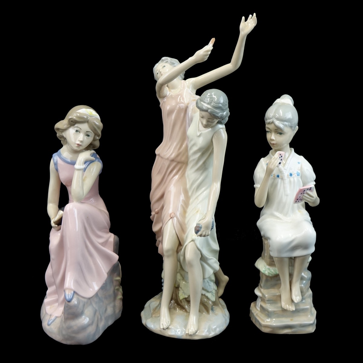 Three (3) Casades Glazed Porcelain Figurines