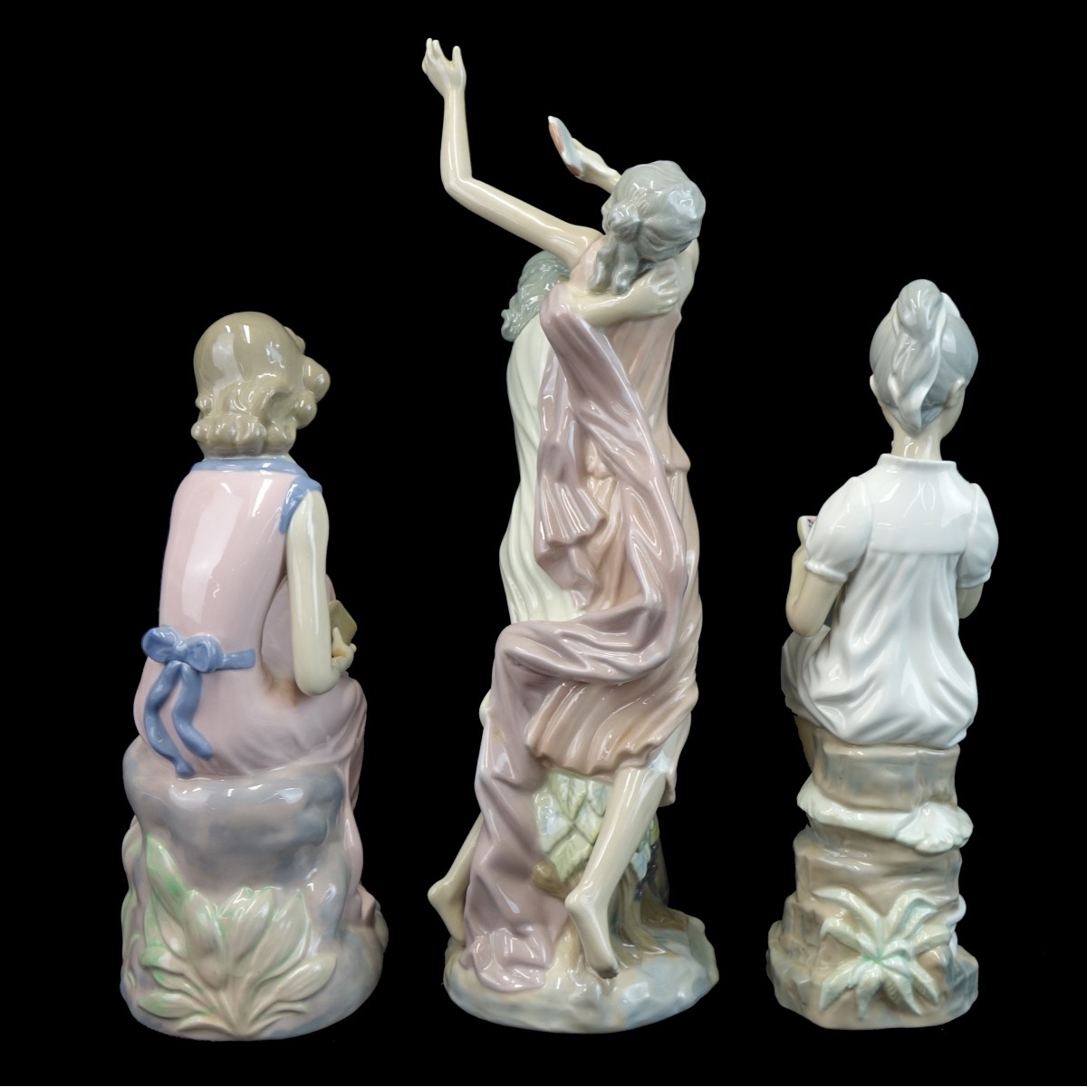 Three (3) Casades Glazed Porcelain Figurines