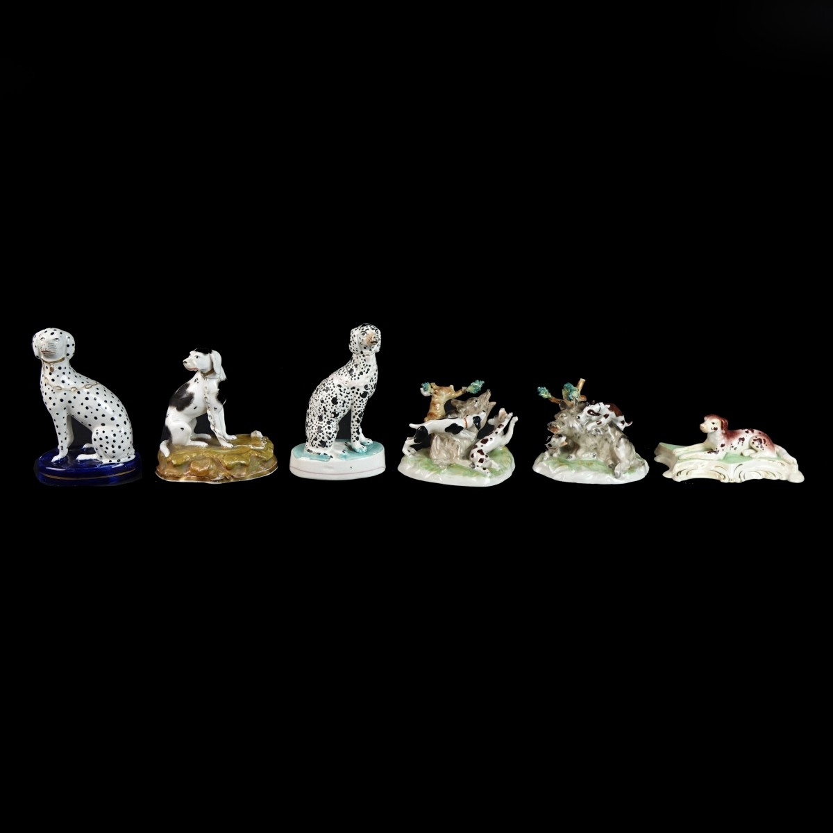 Seven (7) Staffordshire Dog Figurines