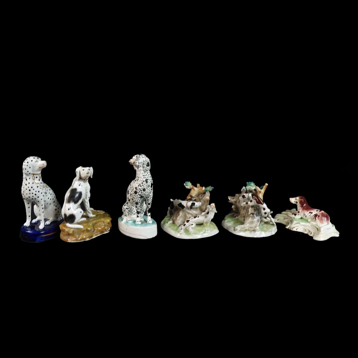 Seven (7) Staffordshire Dog Figurines