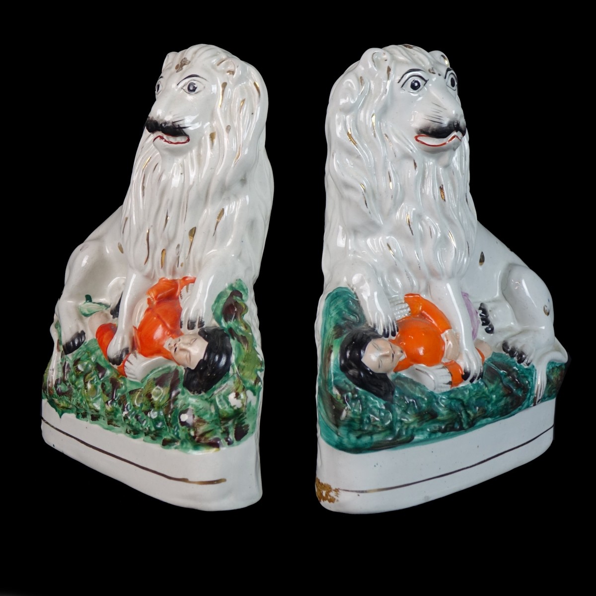 Pair of Staffordshire Lion and Napoleon Figures