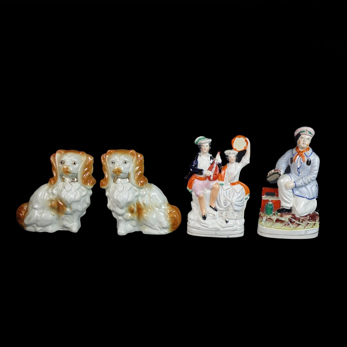 Four (4) Staffordshire Figurines