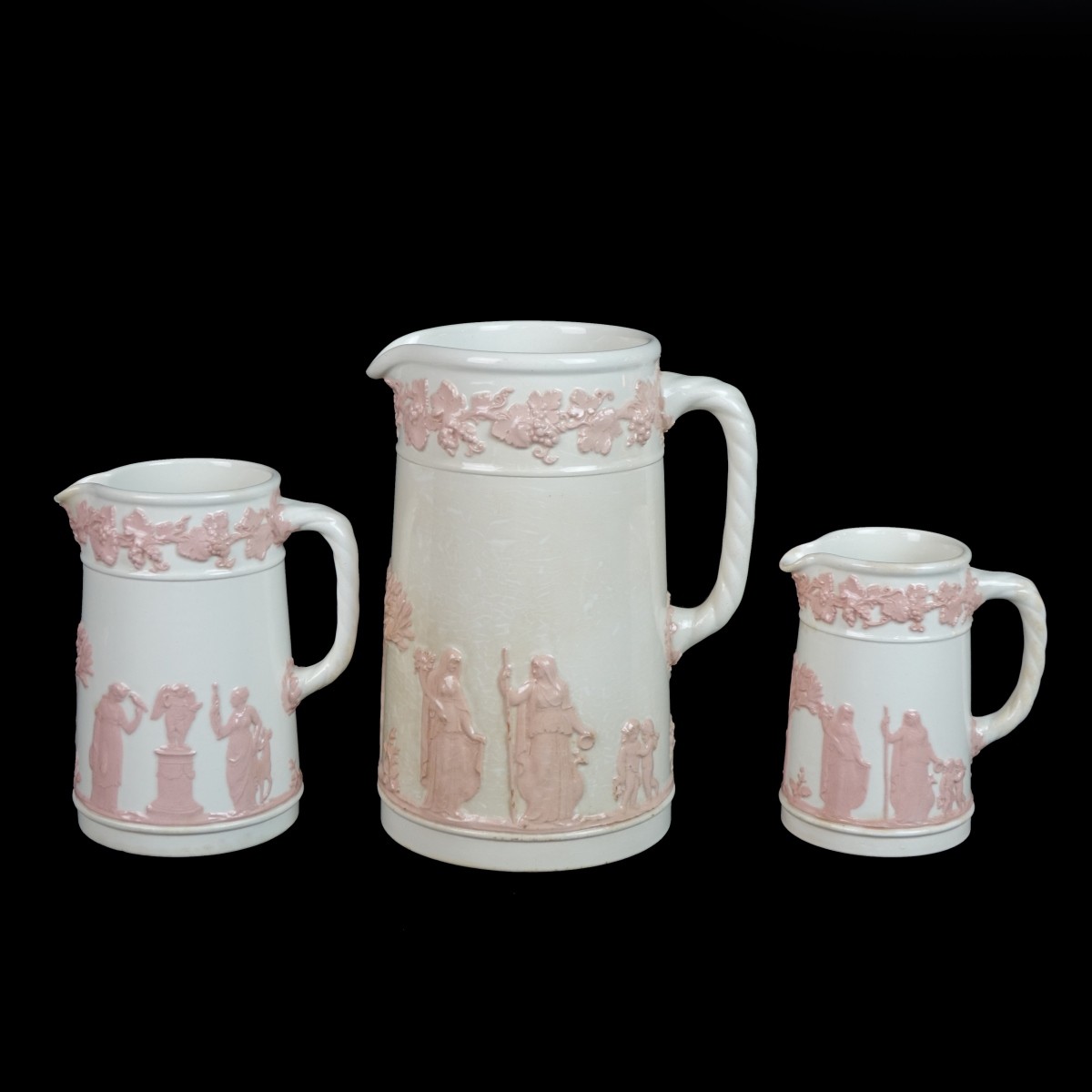 Three (3) Wedgwood Pitchers