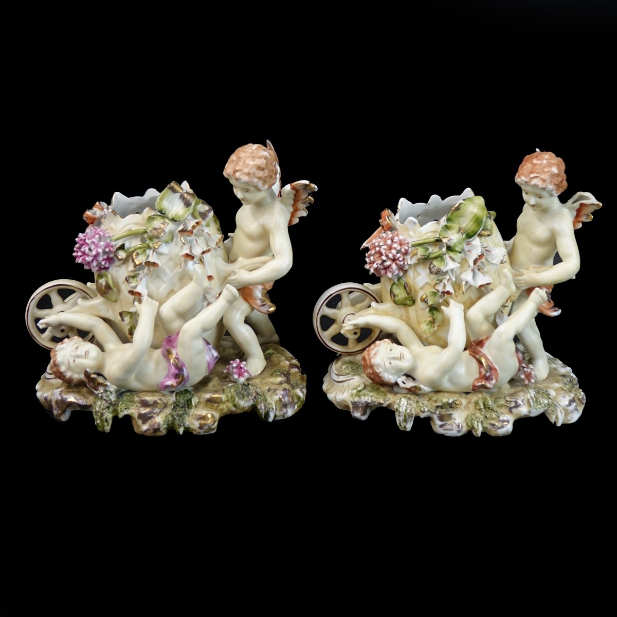 Pair of Continental Cherub Figural Group