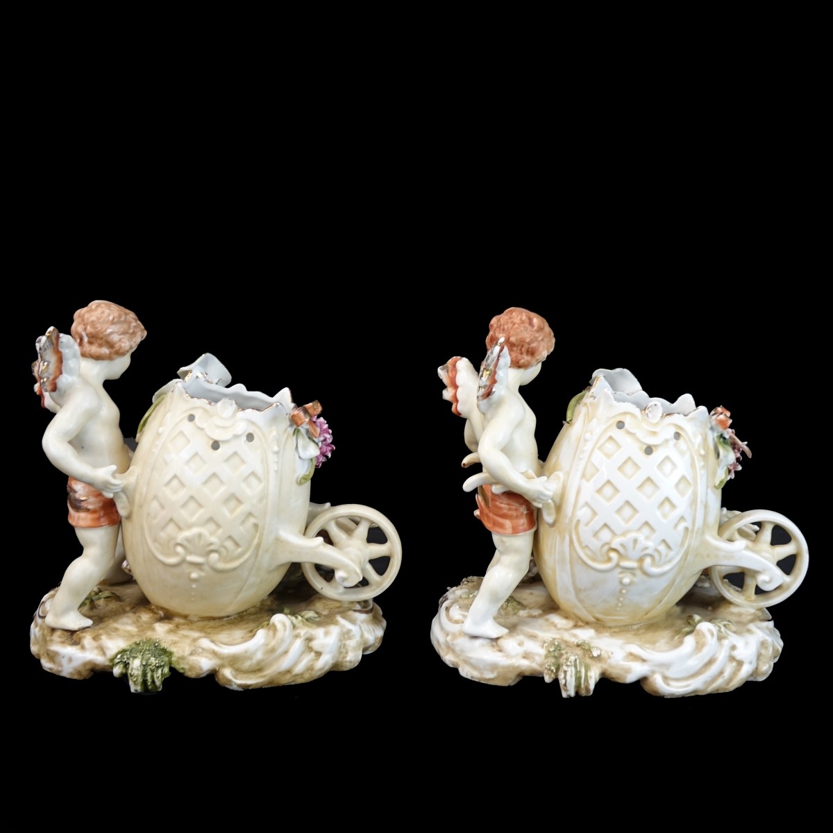 Pair of Continental Cherub Figural Group