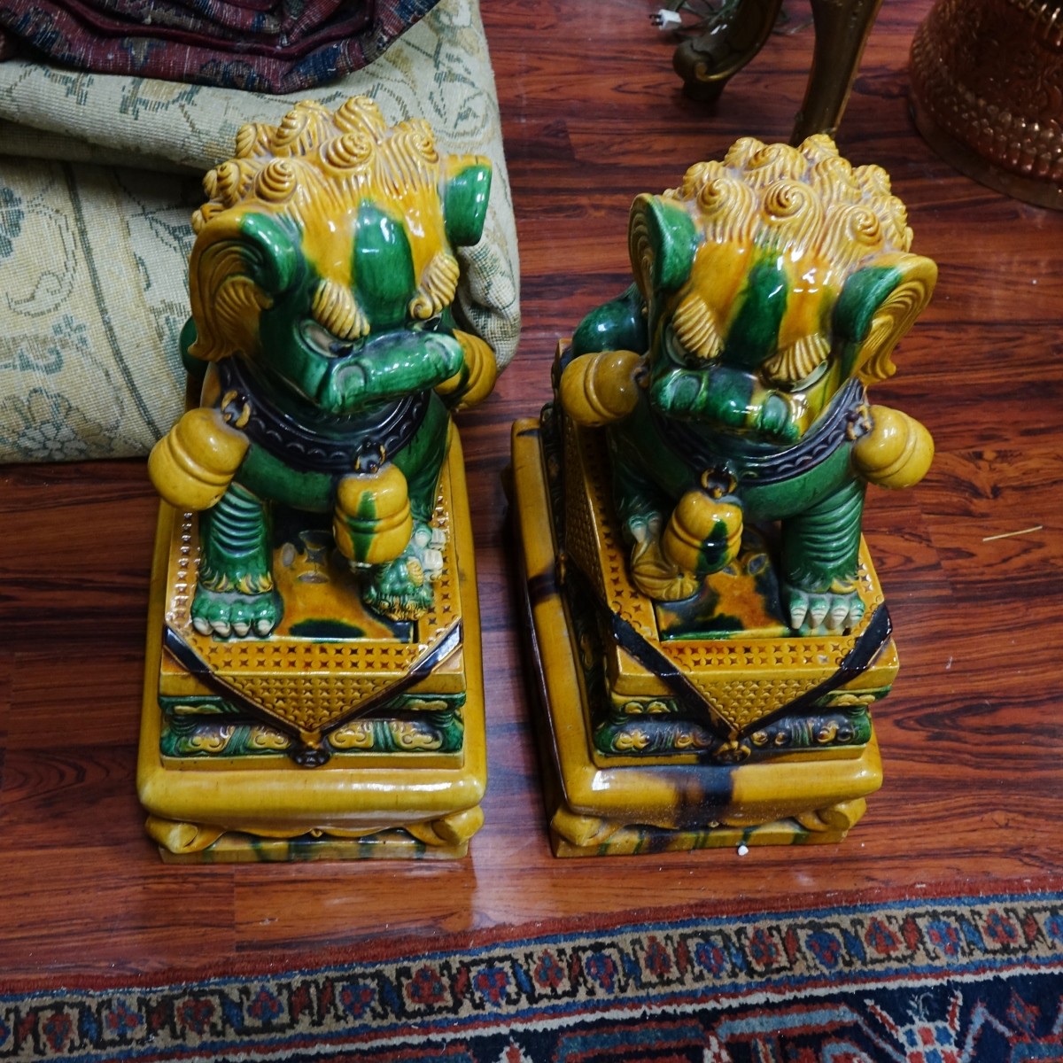 Pair of Chinese Pottery Foo Dogs