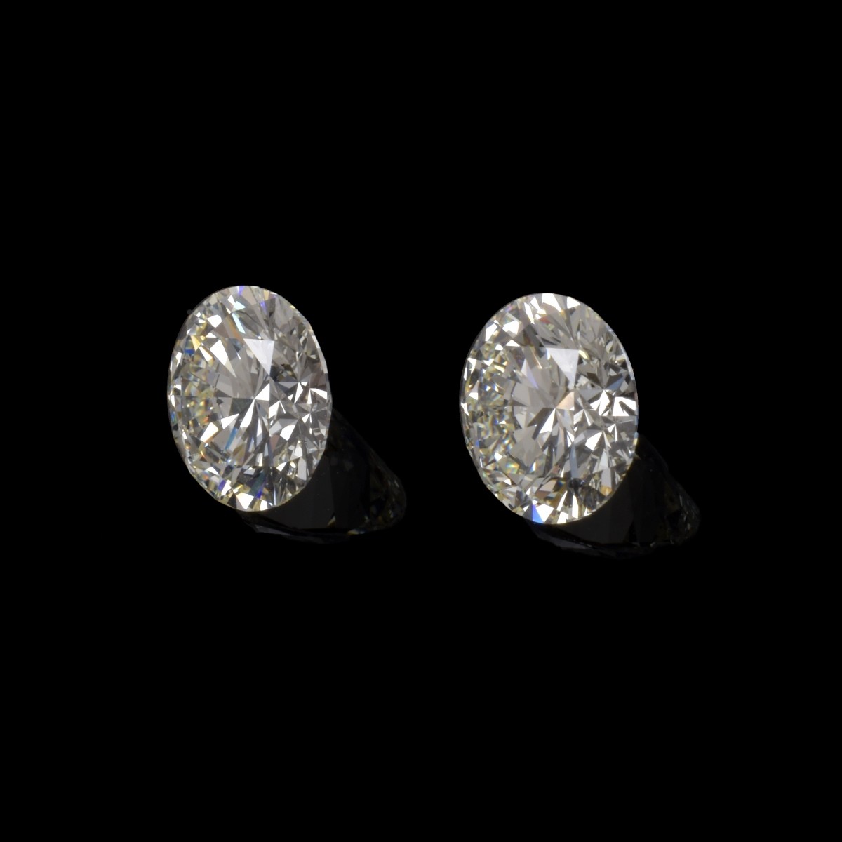 Two GIA 6.41ct TW Round Brilliant Cut Diamonds