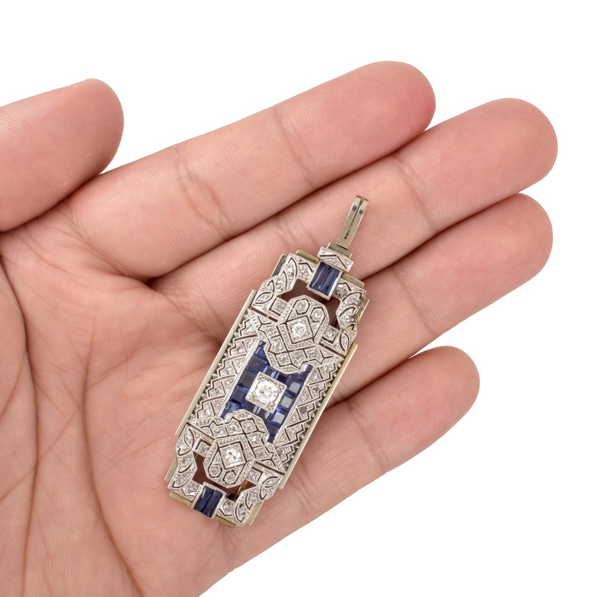 Diamond, Sapphire and 19K Pendant