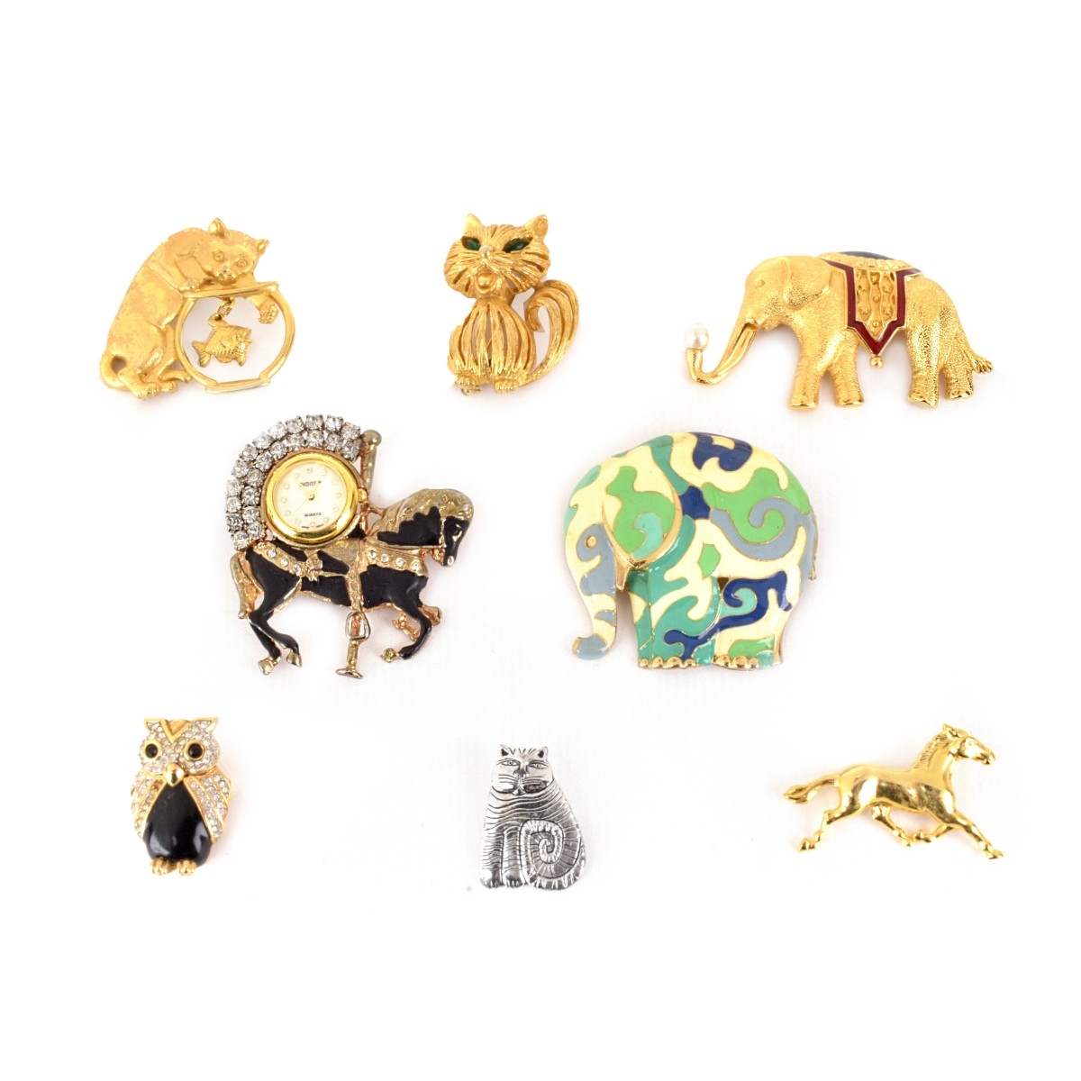 Eight Costume Brooches