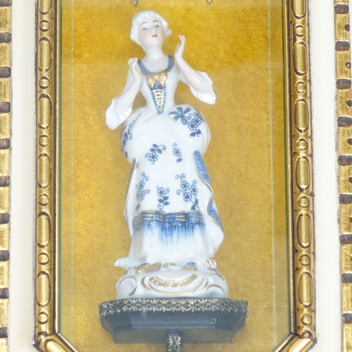 Figurine on Shadowbox Frame