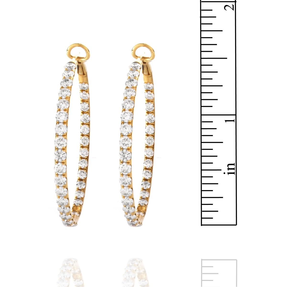 Diamond and 18K Earrings.