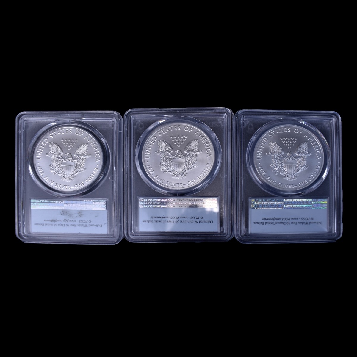 Three $1 Silver Eagle Slabbed 1 Oz. Coins