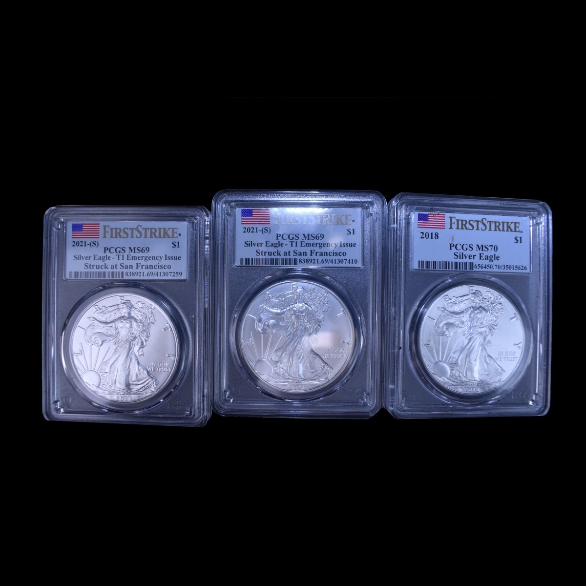 Three $1 Silver Eagle Slabbed 1 Oz. Coins