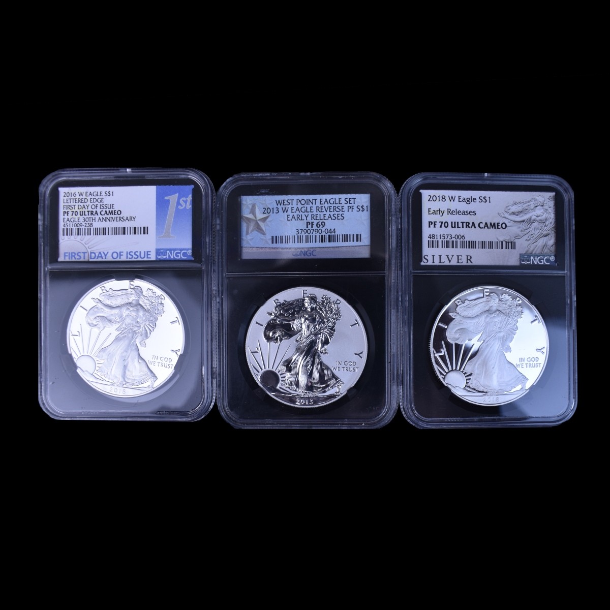 Three $1 Silver Eagle Slabbed 1 Oz. Coins