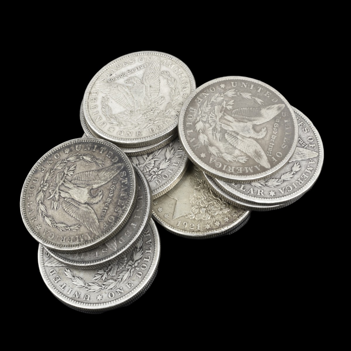 Ten U.S. Morgan Silver Dollars.