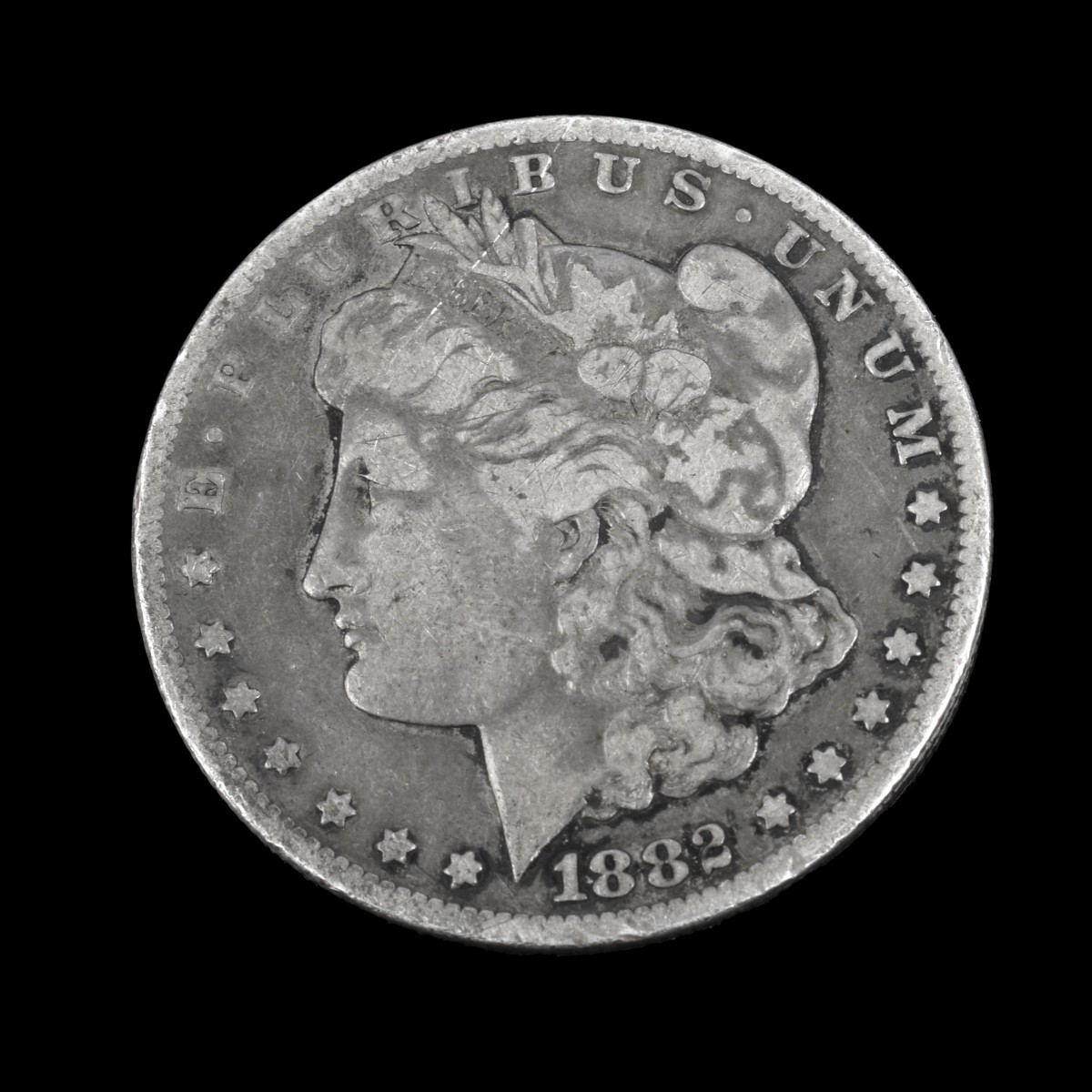 Ten U.S. Morgan Silver Dollars.