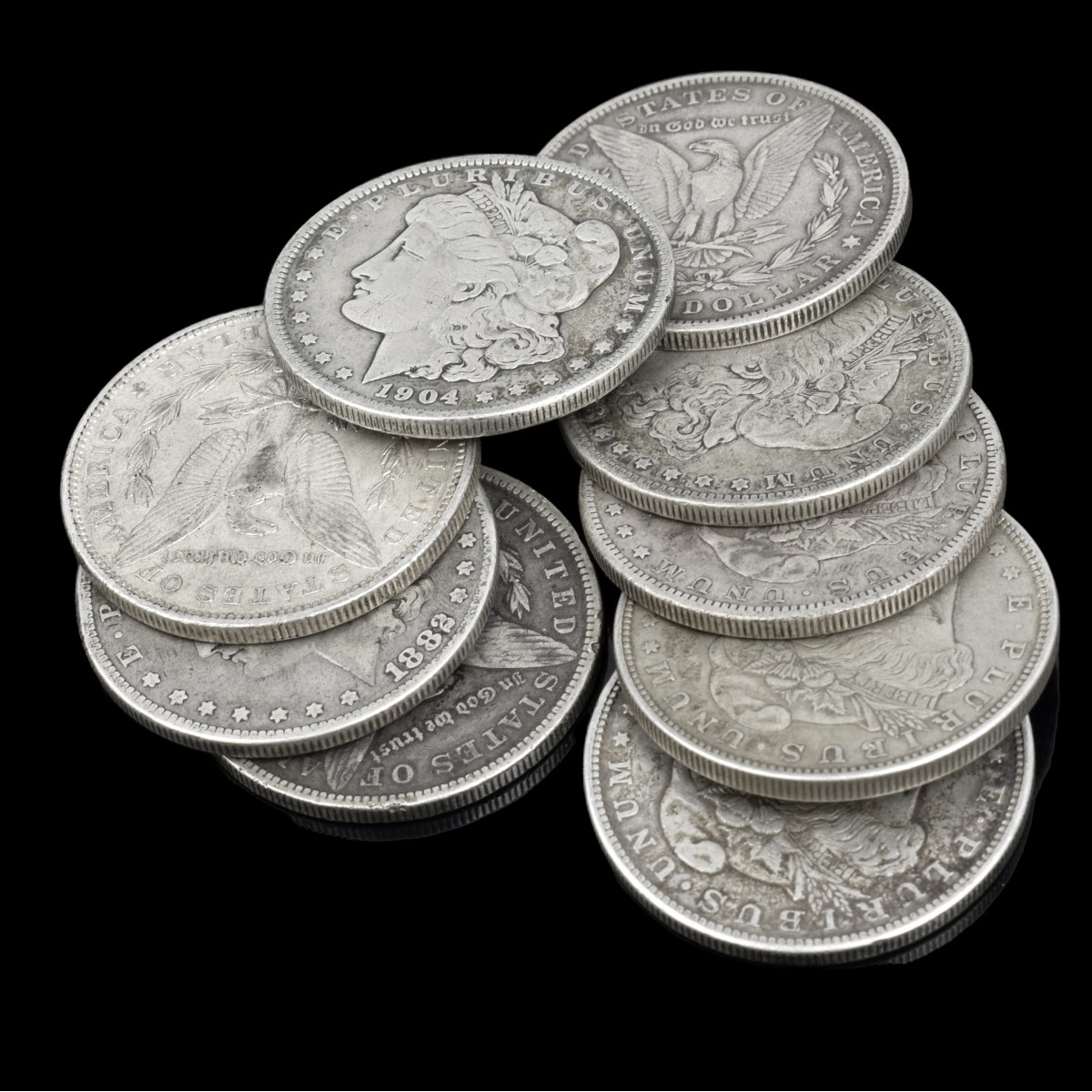 Nine U.S. Silver Morgan Dollars