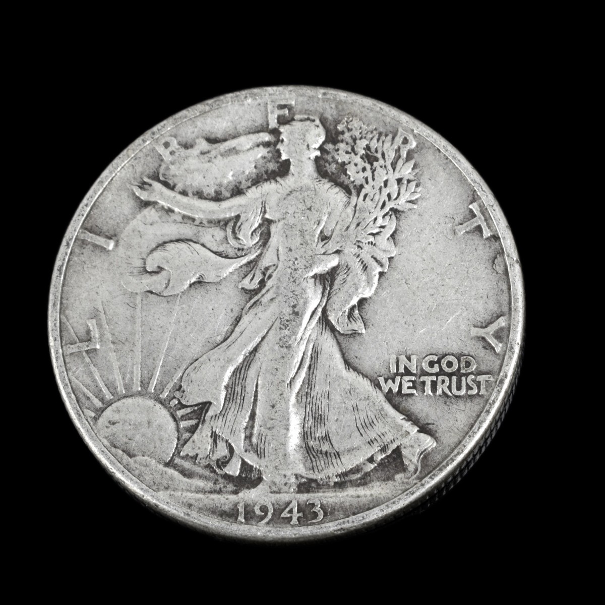 Thirteen U.S. Silver Half Dollars