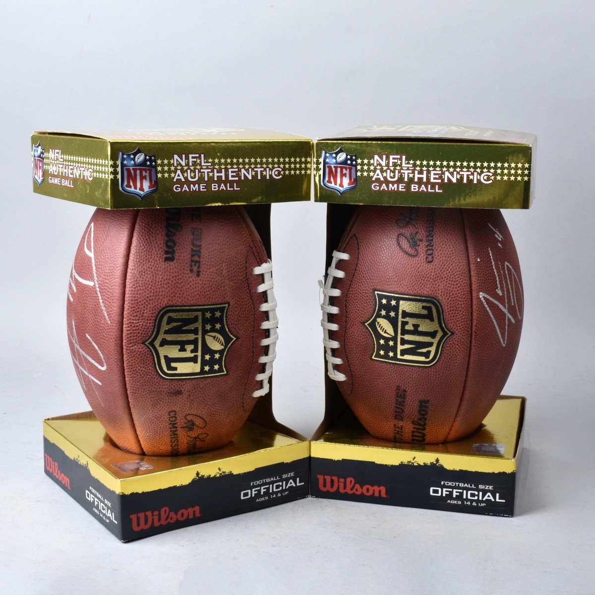 Two (2) NFL Authentic Footballs Landry & Hicton