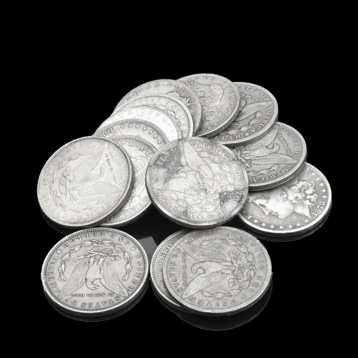 Fourteen U.S. Silver Morgan Dollars