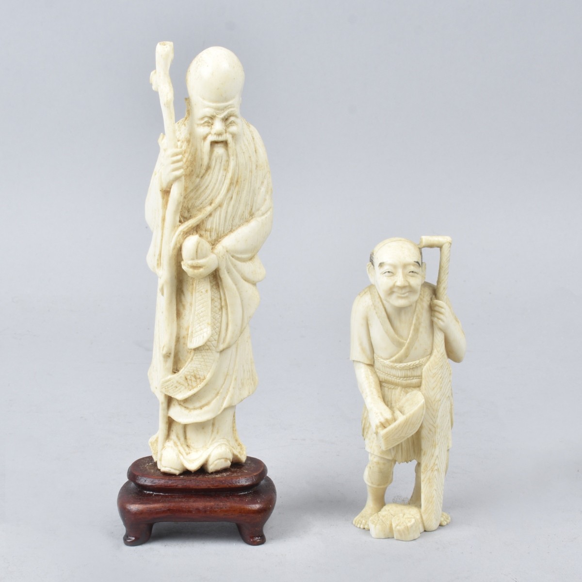 Two Oriental Carved Figurines