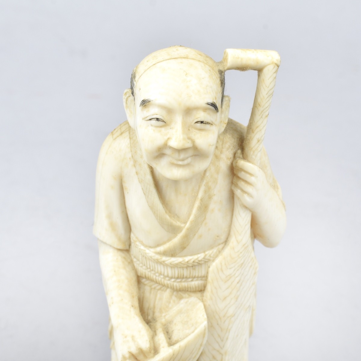 Two Oriental Carved Figurines