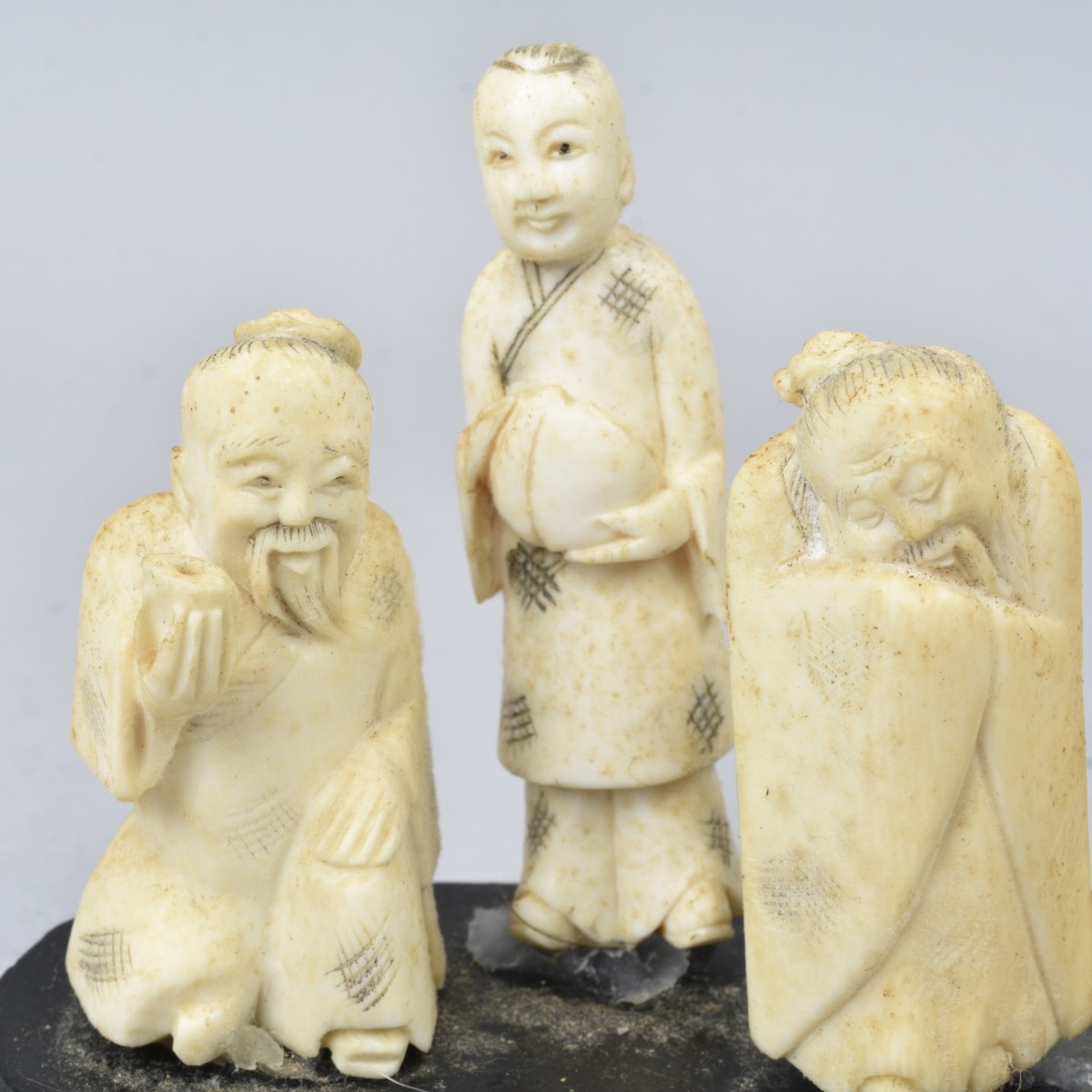 Eight Antique Japanese Carved Netsuke Figurines