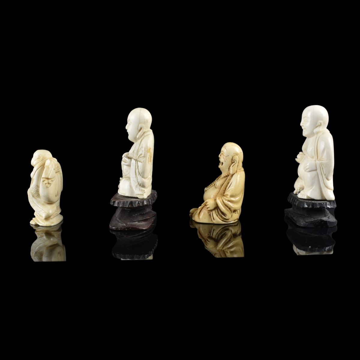 Four Chinese Carved Figurines