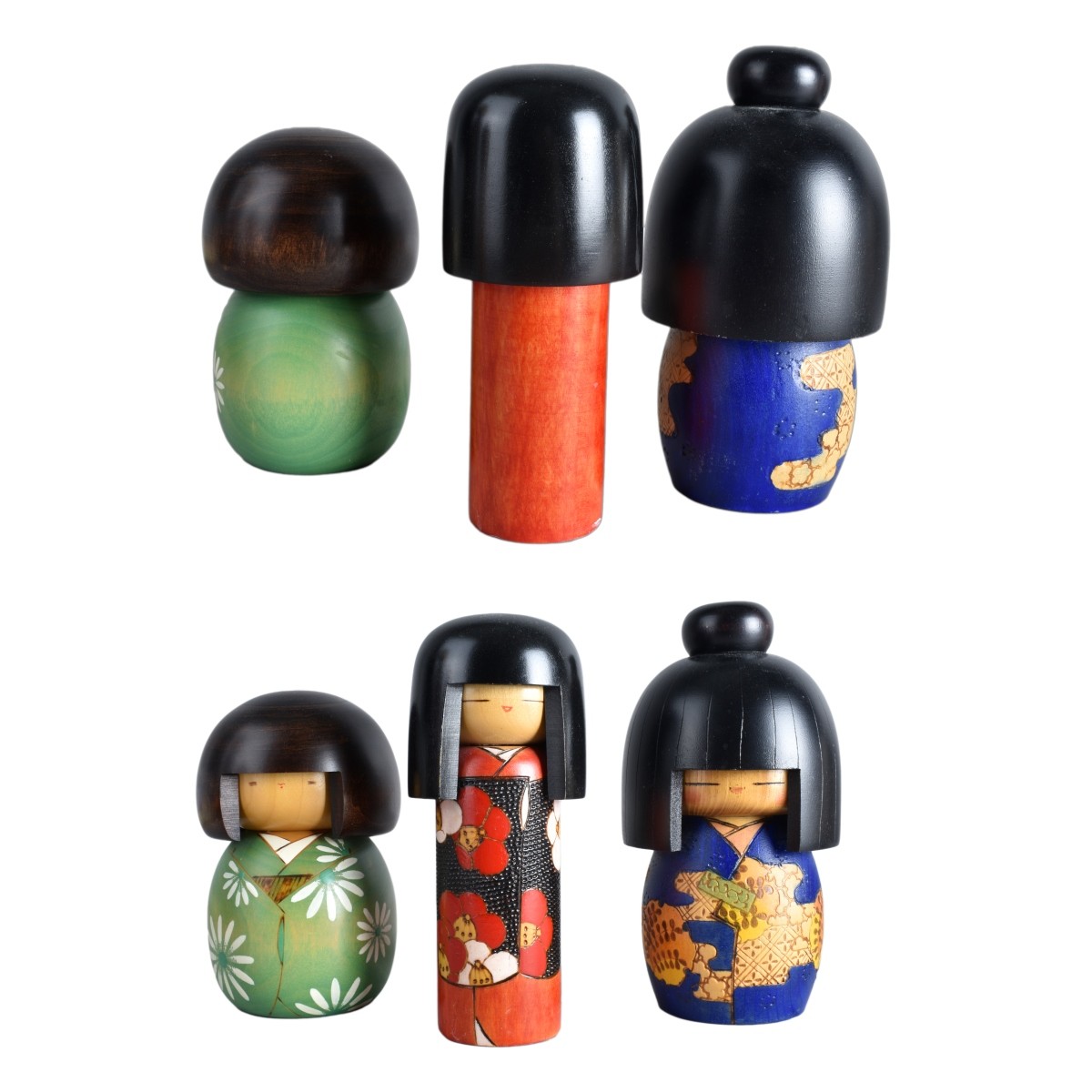 Twelve Vintage Japanese Kokeshi Dolls