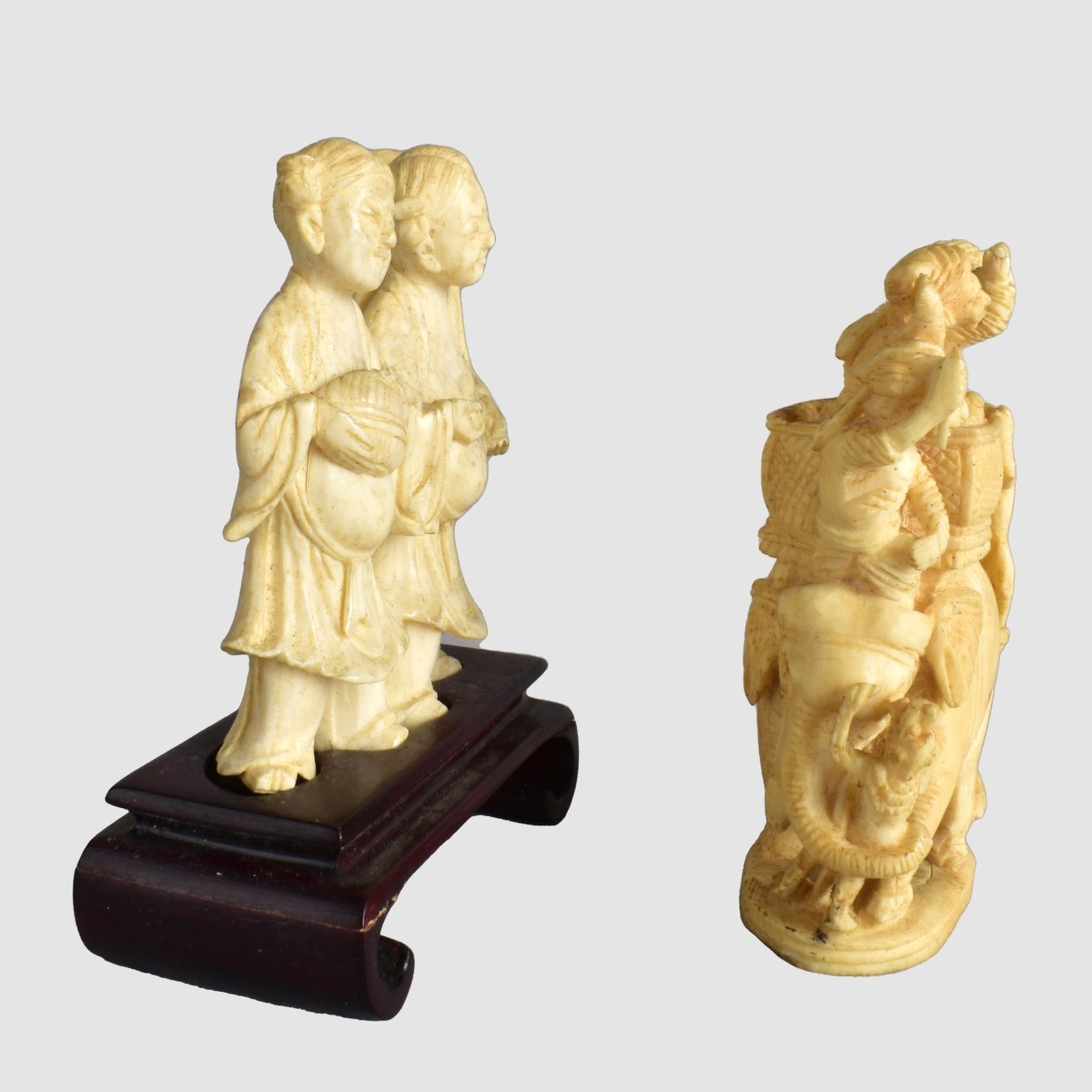 Two Oriental Carved Figurines