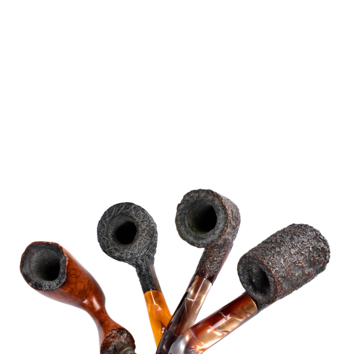 Four Hand Carved Smoking Pipes