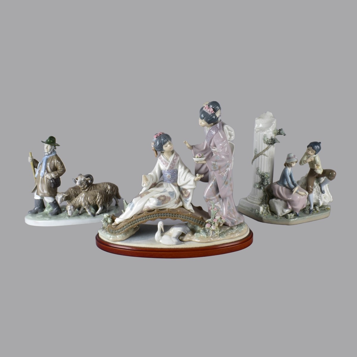 Three Vintage Glazed Porcelain Figurines