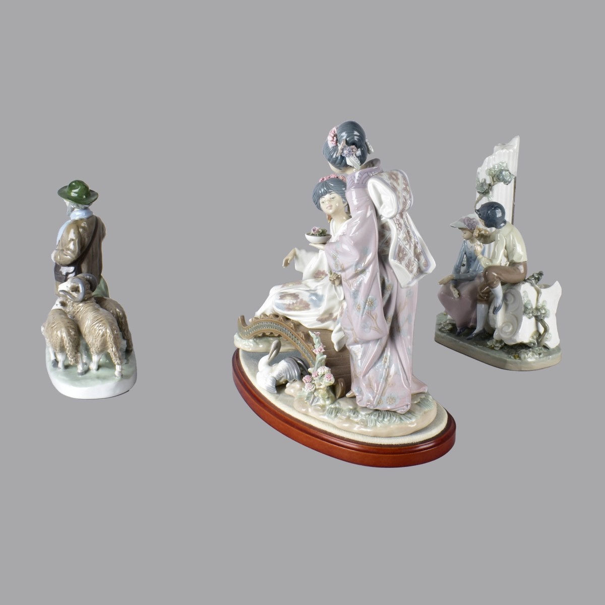 Three Vintage Glazed Porcelain Figurines