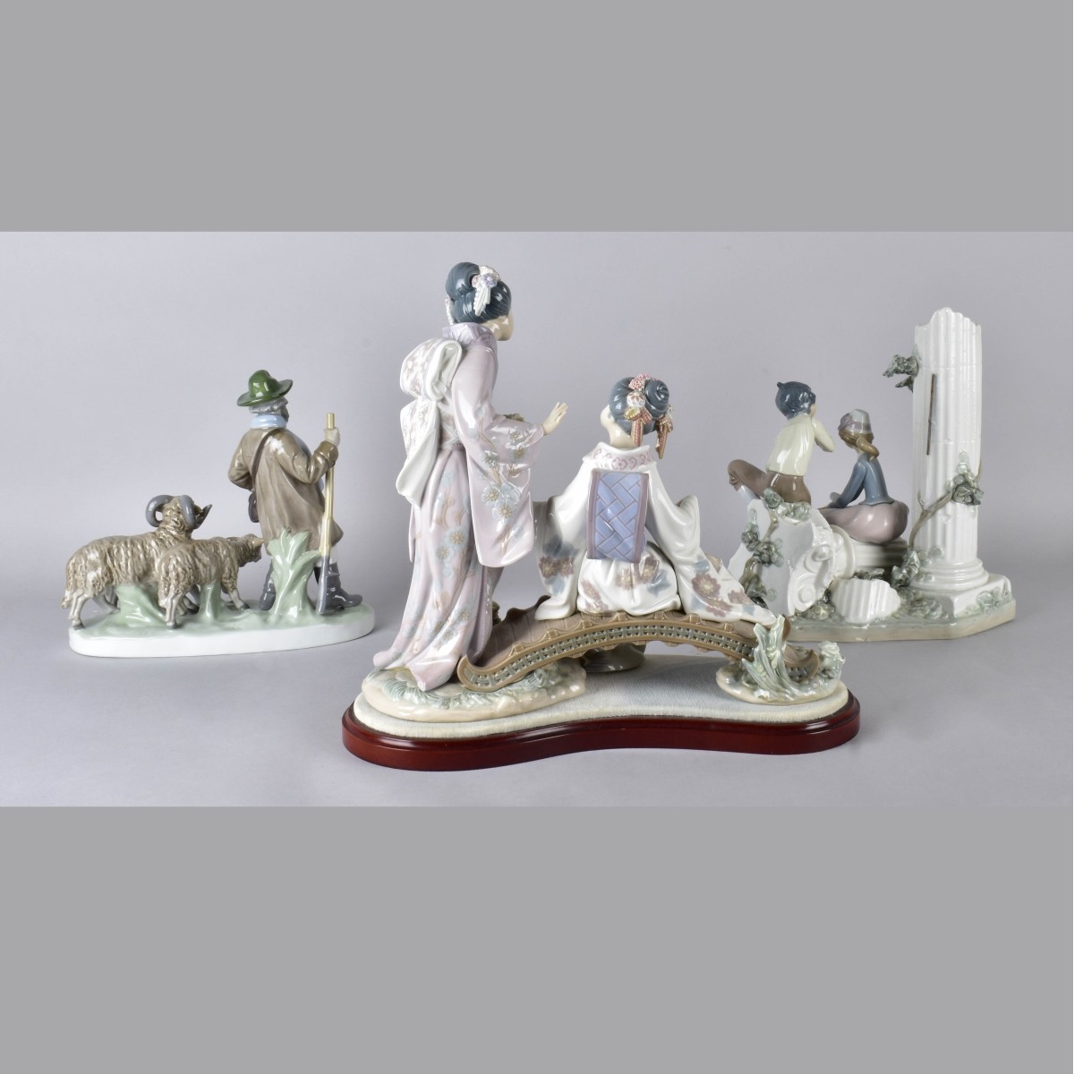 Three Vintage Glazed Porcelain Figurines