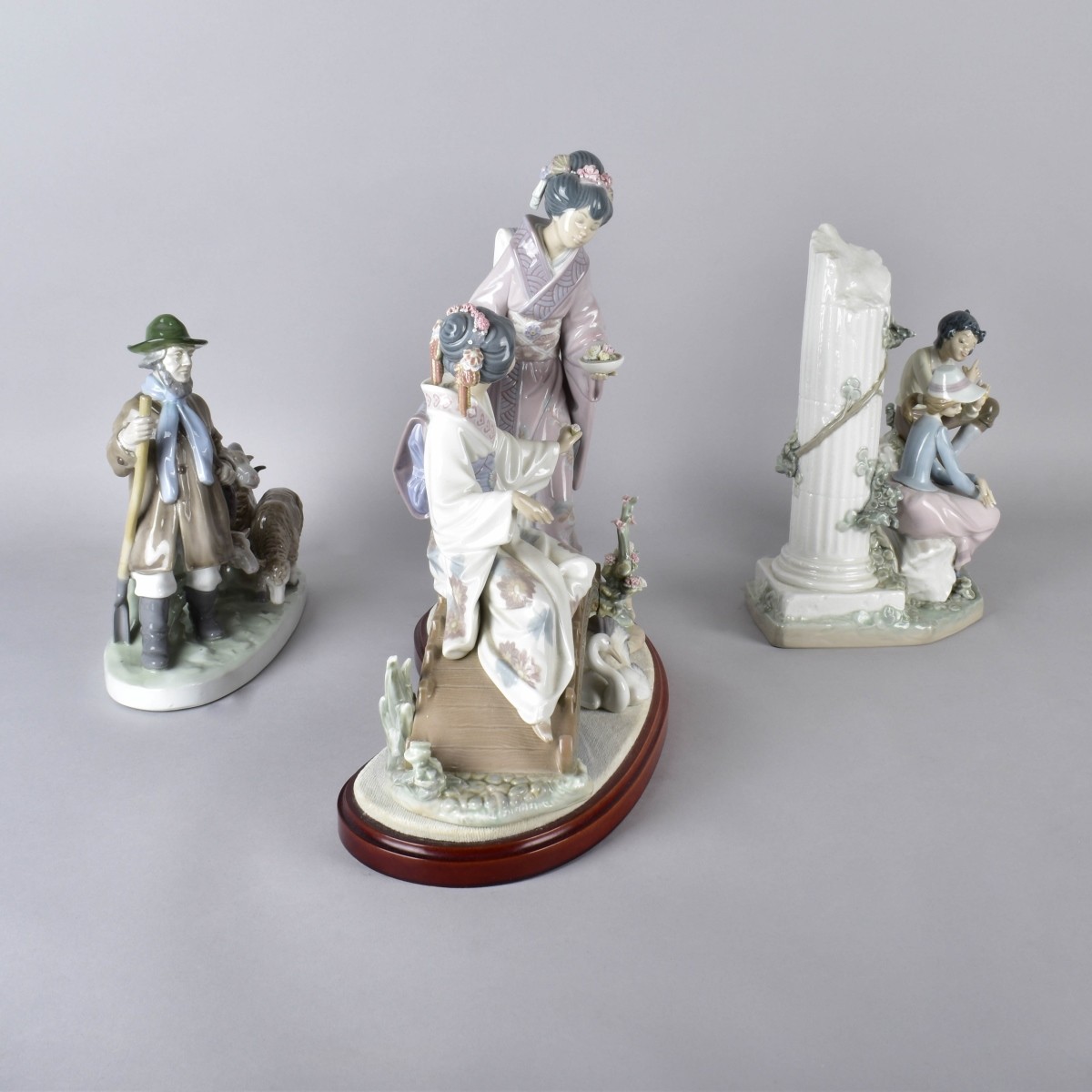 Three Vintage Glazed Porcelain Figurines